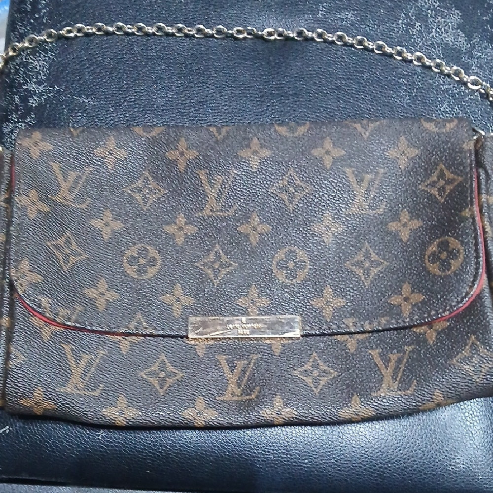 Louis Vuitton Monogram Canvas Clutch with Chain